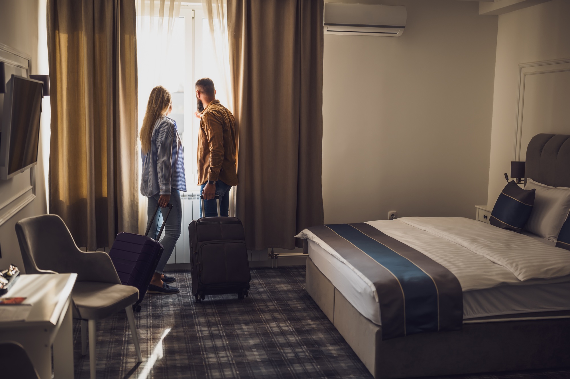 Tourists in hotel room